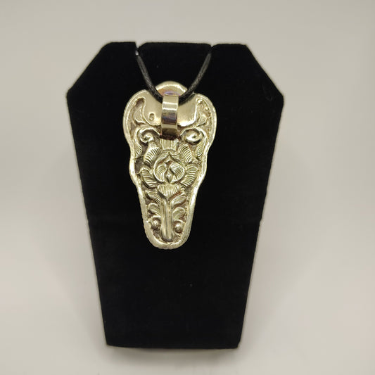 Carved Bone Skull with Turquoise