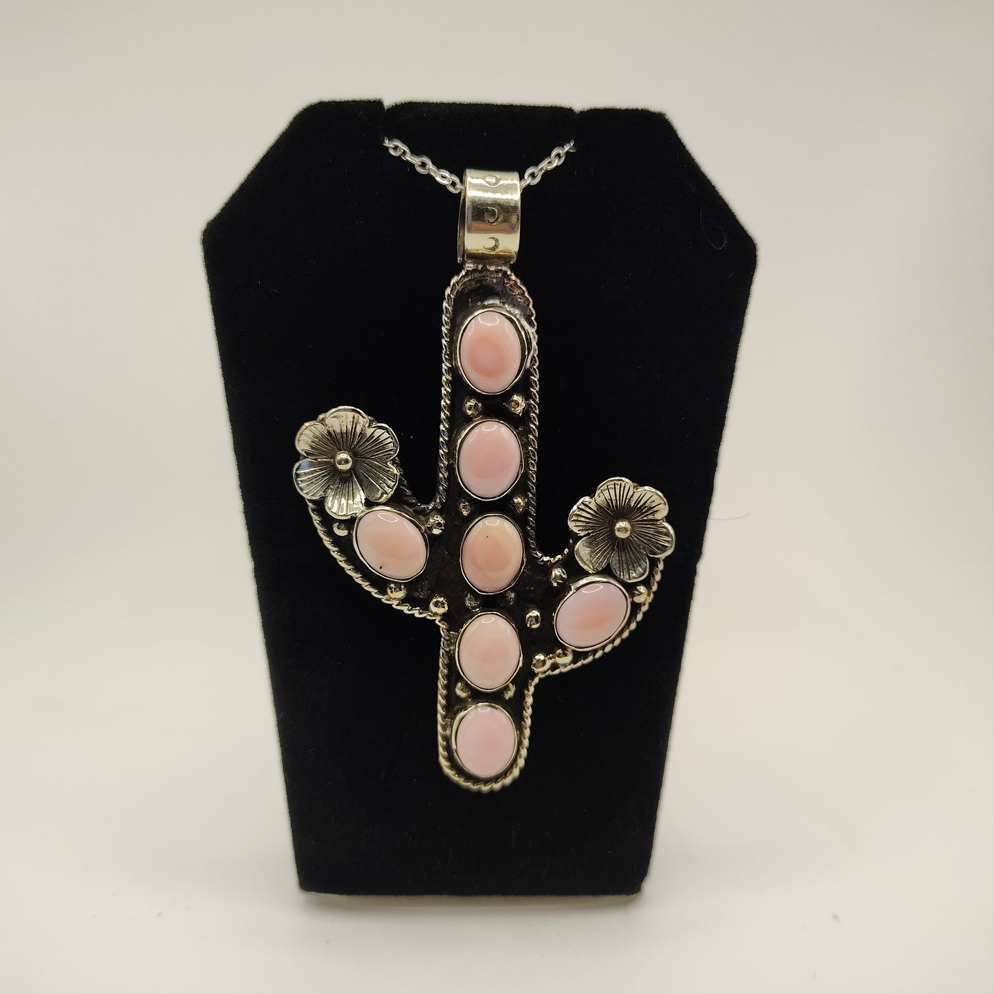Conch shell cactus pendant